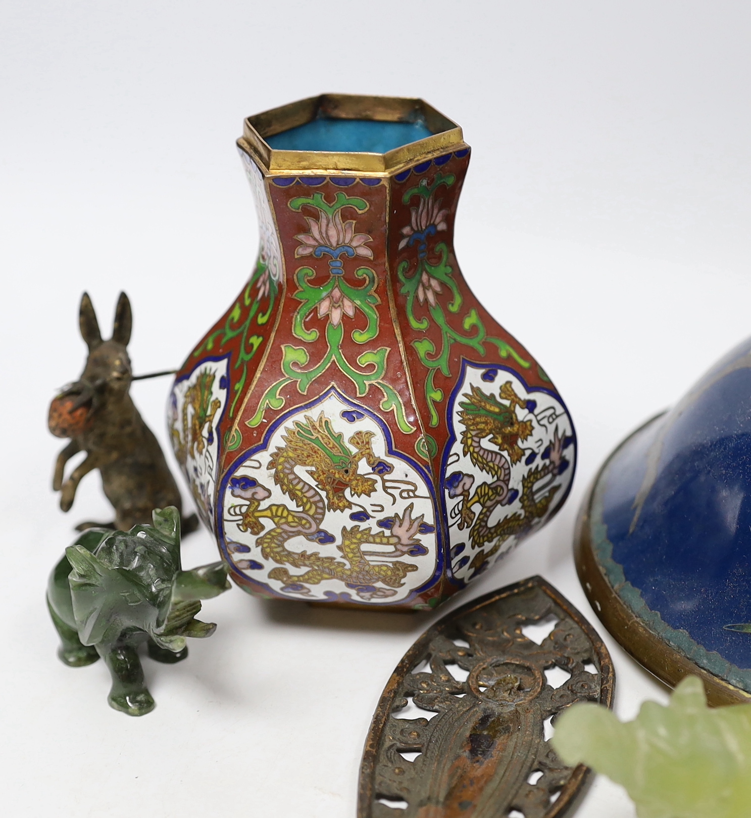 A collection of Chinese and other Oriental items including a cloisonné enamel vase, carved elephants and Buddhas head, largest 9cm high